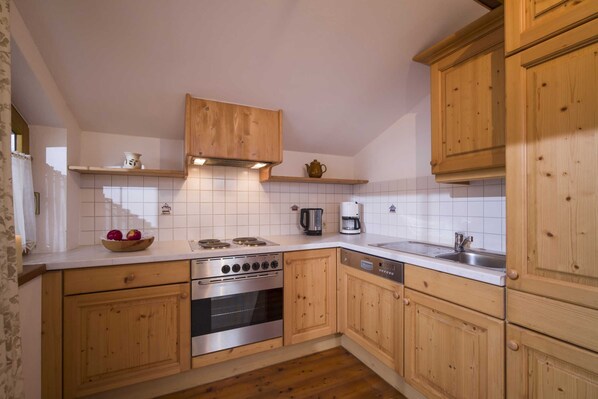 Fridge, oven, dishwasher, high chair