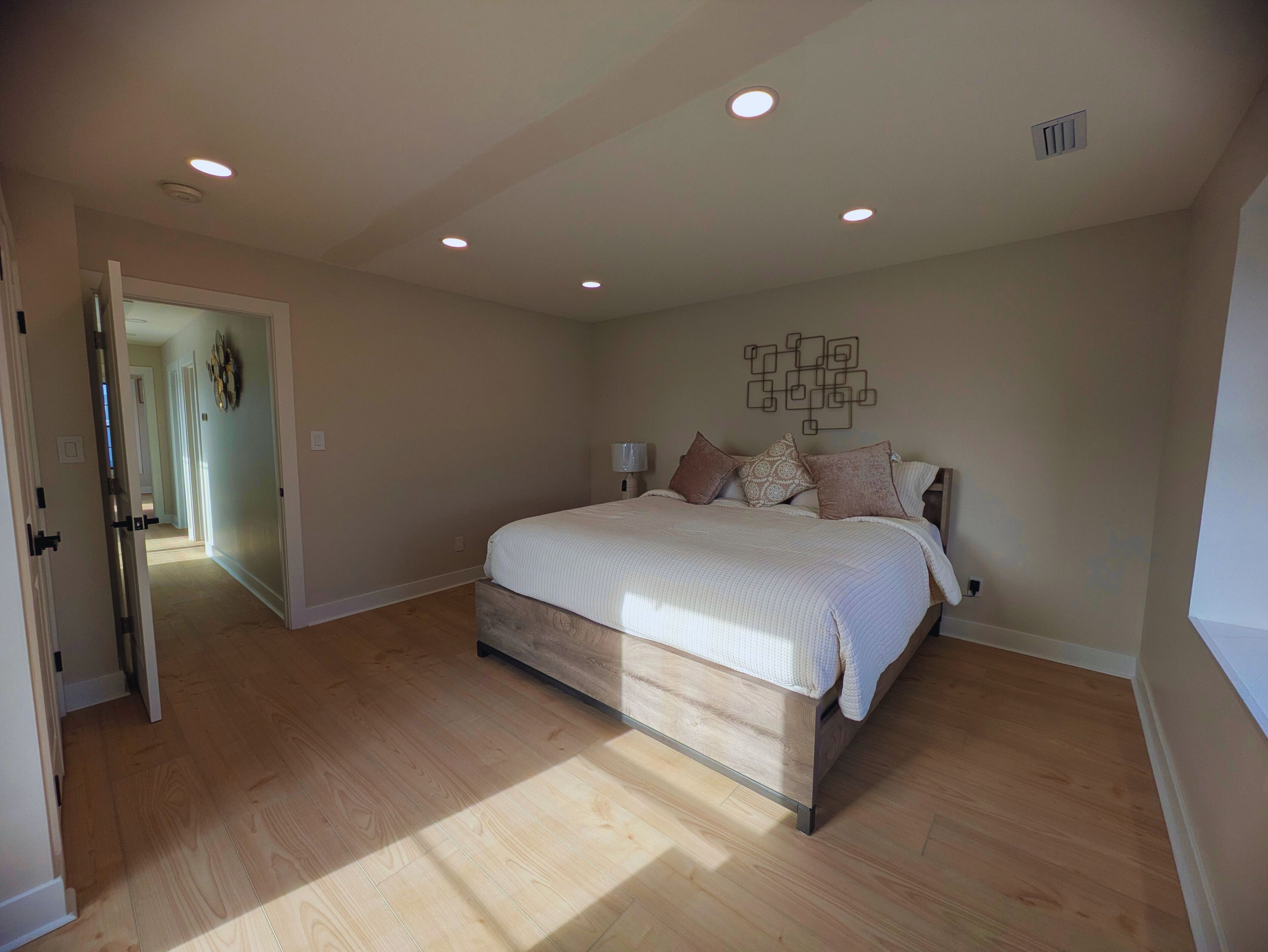 Down duvets, Select Comfort beds, blackout curtains, free WiFi