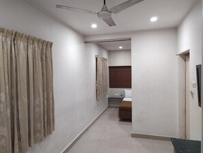 Family Suite | Desk, iron/ironing board, bed sheets - The Royal Residency (Perambalur)