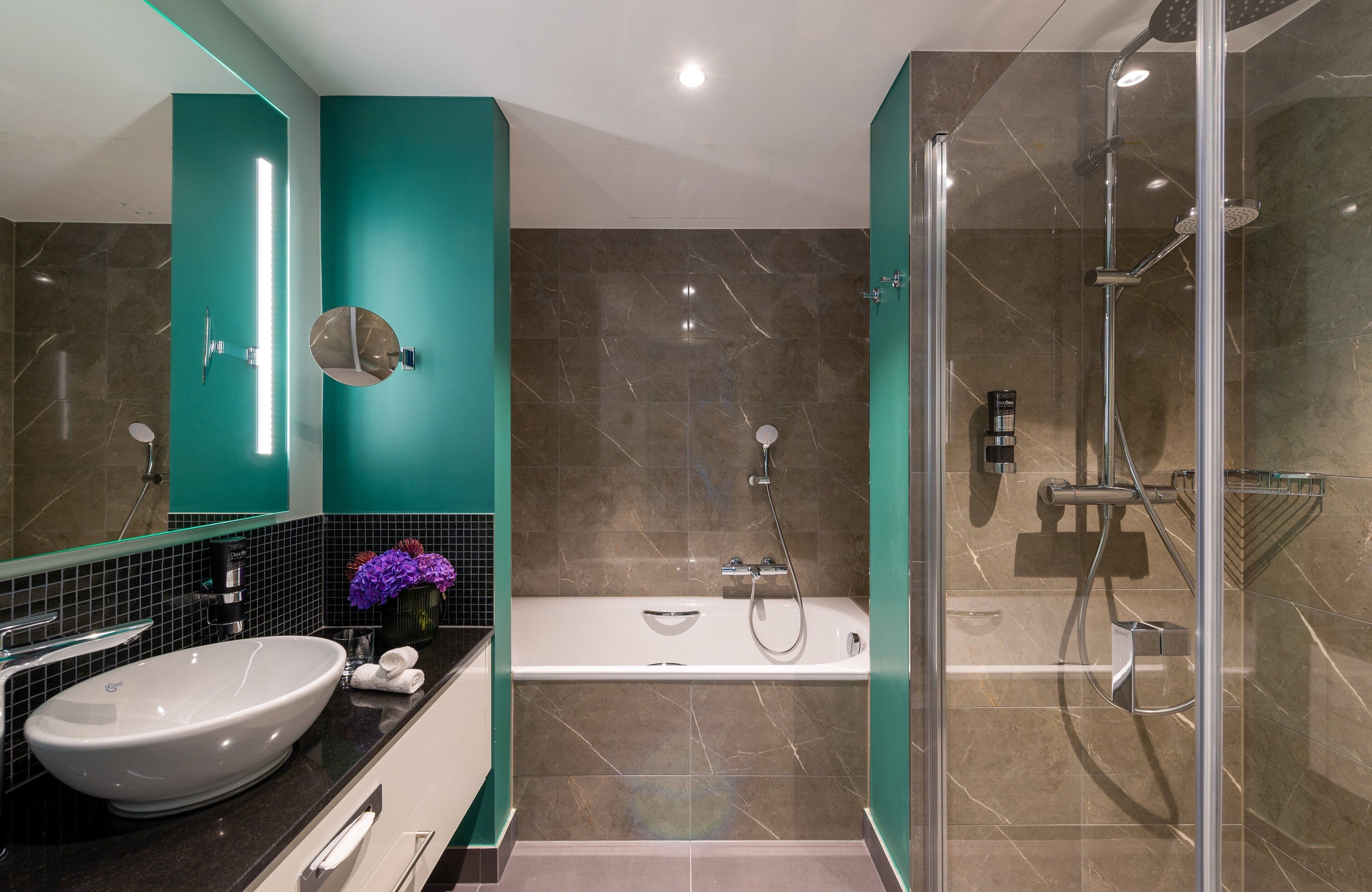 junior suite | bathroom | eco-friendly toiletries, hair dryer, towels