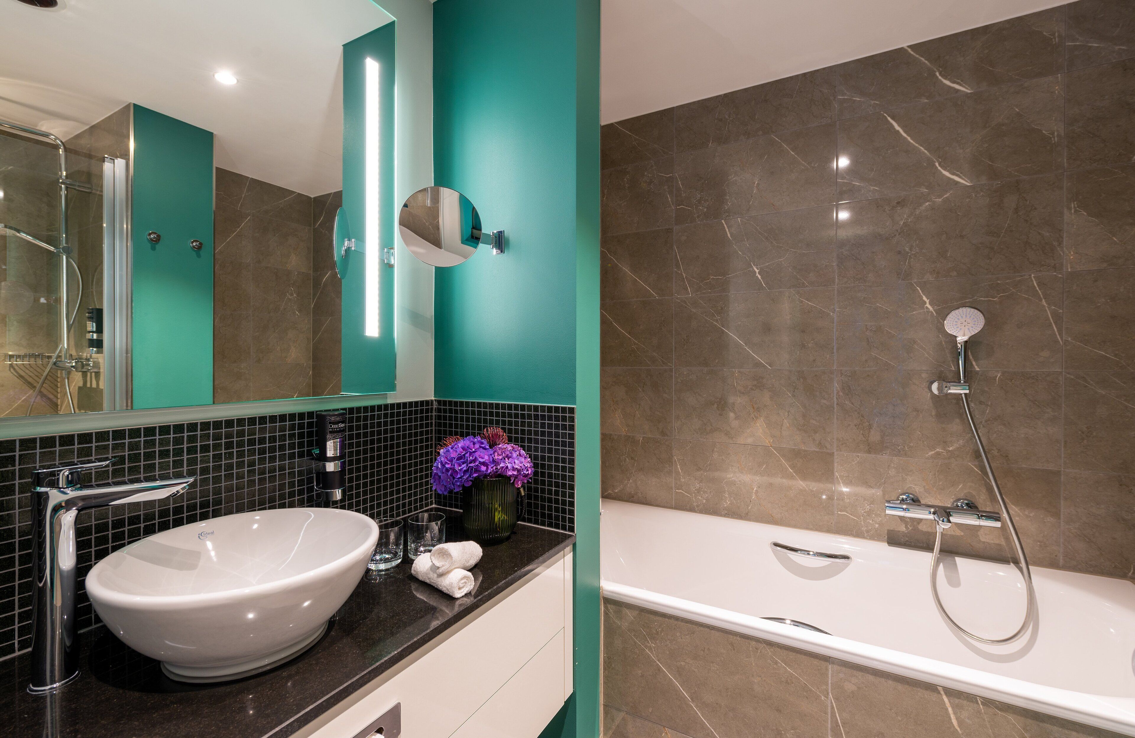 junior suite | bathroom | eco-friendly toiletries, hair dryer, towels