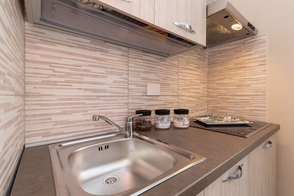 Apartment | Private kitchen | Fridge, microwave, electric kettle, toaster - Cialdini Apartment near City Center (Turin)