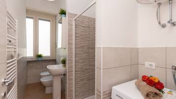 Apartment | Bathroom | Shower, hair dryer, bidet, soap