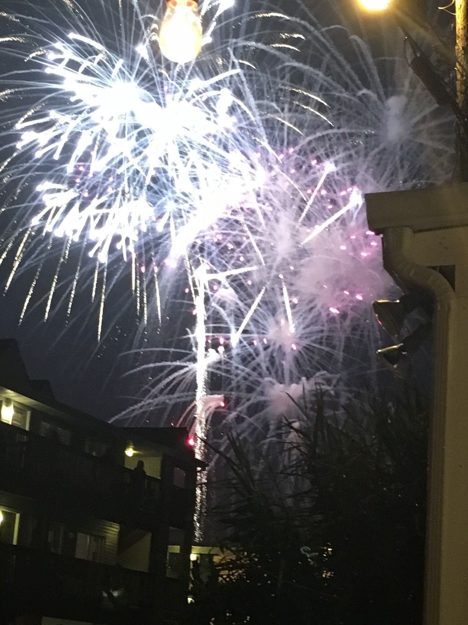 A night sky with fireworks.