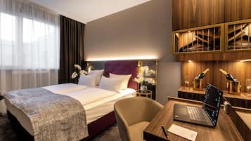 Hypo-allergenic bedding, in-room safe, desk, blackout drapes