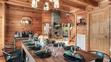 Deluxe Cabin, 6 Bedrooms, Hot Tub, Mountain View | Living area | TV, fireplace