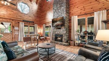 Deluxe Cabin, 6 Bedrooms, Hot Tub, Mountain View | Living area | TV, fireplace