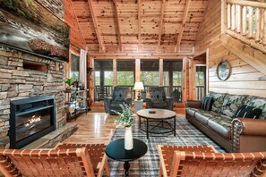 Deluxe Cabin, 6 Bedrooms, Hot Tub, Mountain View | Living area | TV, fireplace