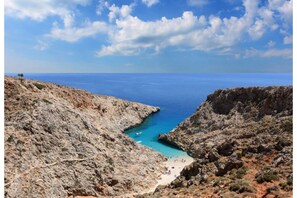 A rugged coastline with a narrow beach area. - Villa Maria, Oropos, Greece (Oropos)