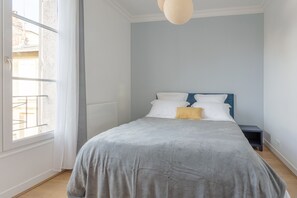 2 slaapkamers, een strijkplank/strijkijzer, gratis wifi, beddengoed