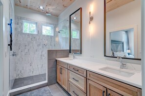 Combined shower/tub, hair dryer, towels, soap