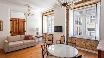 Superior Apartment, 1 Bedroom | Living area | 32-inch LCD TV with cable channels, TV