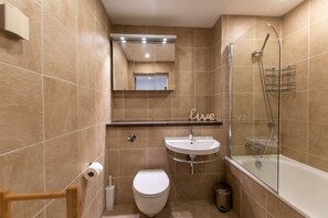 Combined shower/tub, hair dryer