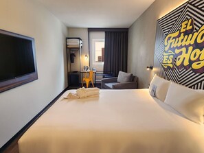 Standaard kamer, meerdere bedden | Luxe beddengoed, donzen dekbedden, een minibar, een kluis op de kamer