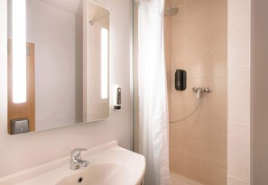 Shower, towels, soap, toilet paper