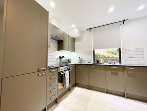 Apartamento, baño privado | Cocina compartida