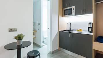 Standard Double Room | Private kitchen | Microwave, coffee/tea maker, electric kettle, toaster
