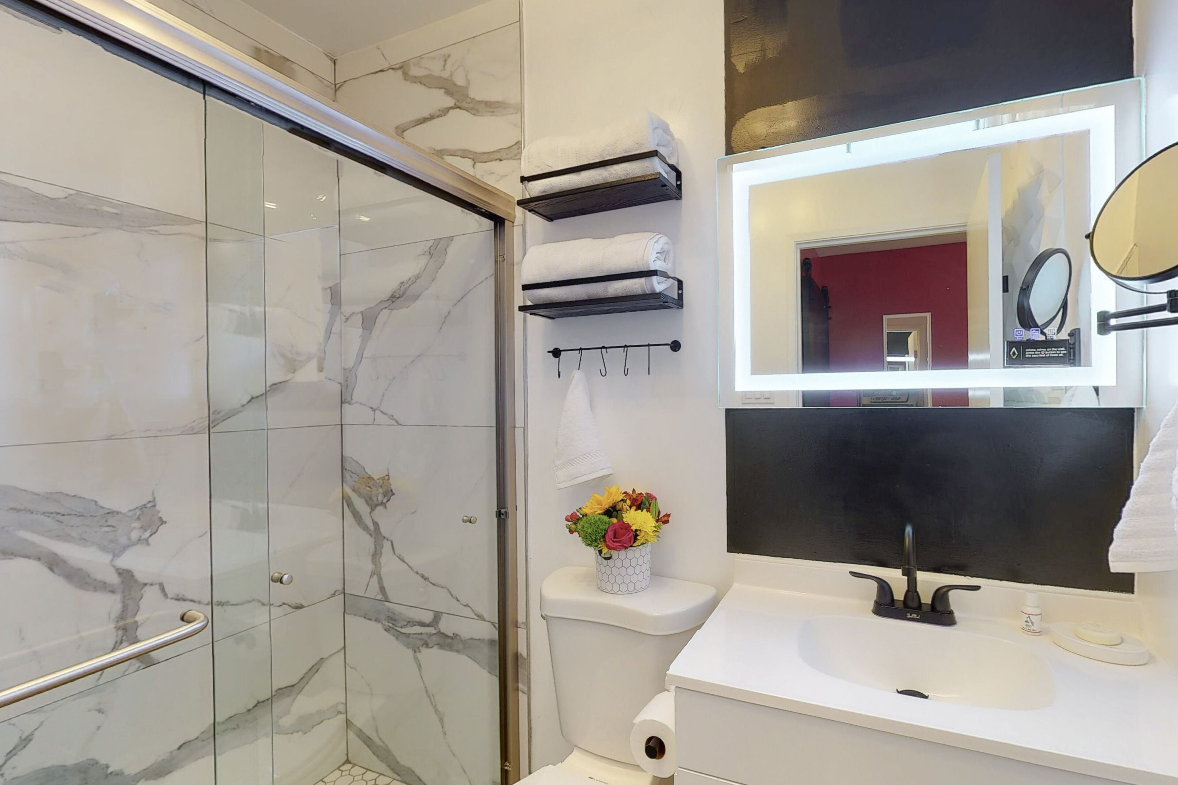 shower, hydromassage showerhead, designer toiletries, hair dryer