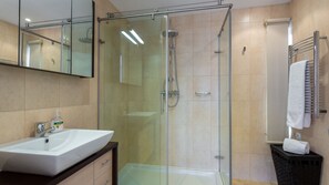 Bathtub, hair dryer, towels, soap