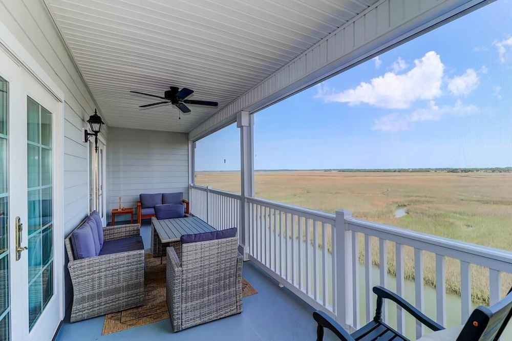 Stunning River and Marsh views! Community pool and short walk to beach!
