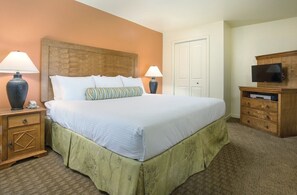 2 dormitorios, tabla de planchar con plancha, ropa de cama