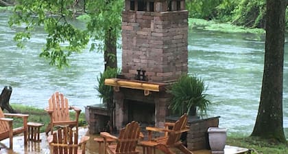 Mammoth Spring Retreat. Gated for privacy, Five cabins, one price. On the River