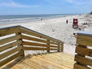On the beach, sun-loungers, beach towels
