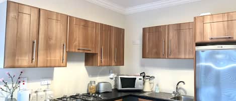 Fridge, microwave, oven, stovetop