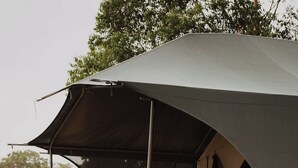 A tent with a balcony and stairs. - Baudin Wandagar Eco Tent—Off-Grid Eco Glamping (Pemberton)