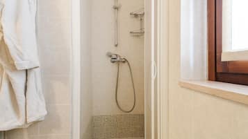 Apartment, 1 Bedroom | Bathroom | Shower, rainfall showerhead, hair dryer, bidet