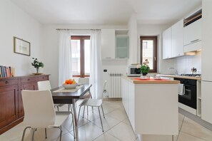 Apartment, 1 Bedroom | Private kitchen | Full-size fridge, microwave, oven, stovetop - Casa Selleri Terrace Apartment (Lecce)
