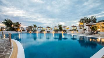Outdoor pool, open 10:00 AM to 6:00 PM, pool umbrellas, pool loungers