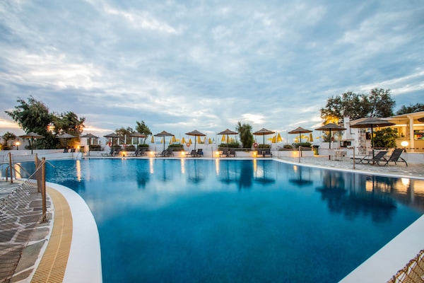 Outdoor pool, open 10:00 AM to 6:00 PM, pool umbrellas, sun loungers