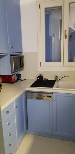 Villa | Private kitchen | Fridge, microwave, oven, stovetop