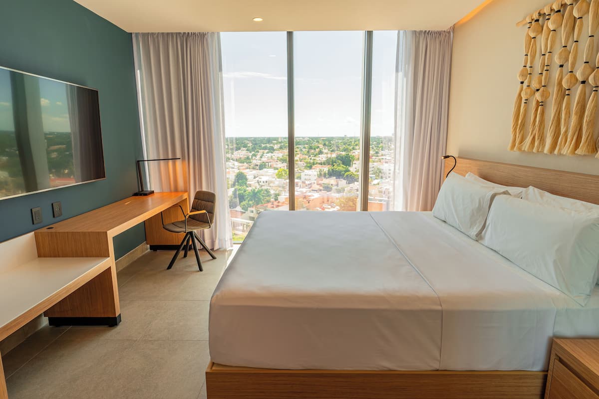 Premium Room, 1 King Bed, City View (Pet Friendly) | In-room safe, desk, laptop workspace, blackout drapes