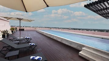 Outdoor pool, open 9:00 AM to 8:00 PM, pool umbrellas, sun loungers