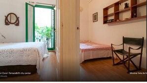 A bedroom with a bed, a chair, and a shelf with items.