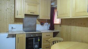 Fridge, microwave, cookware/dishes/utensils