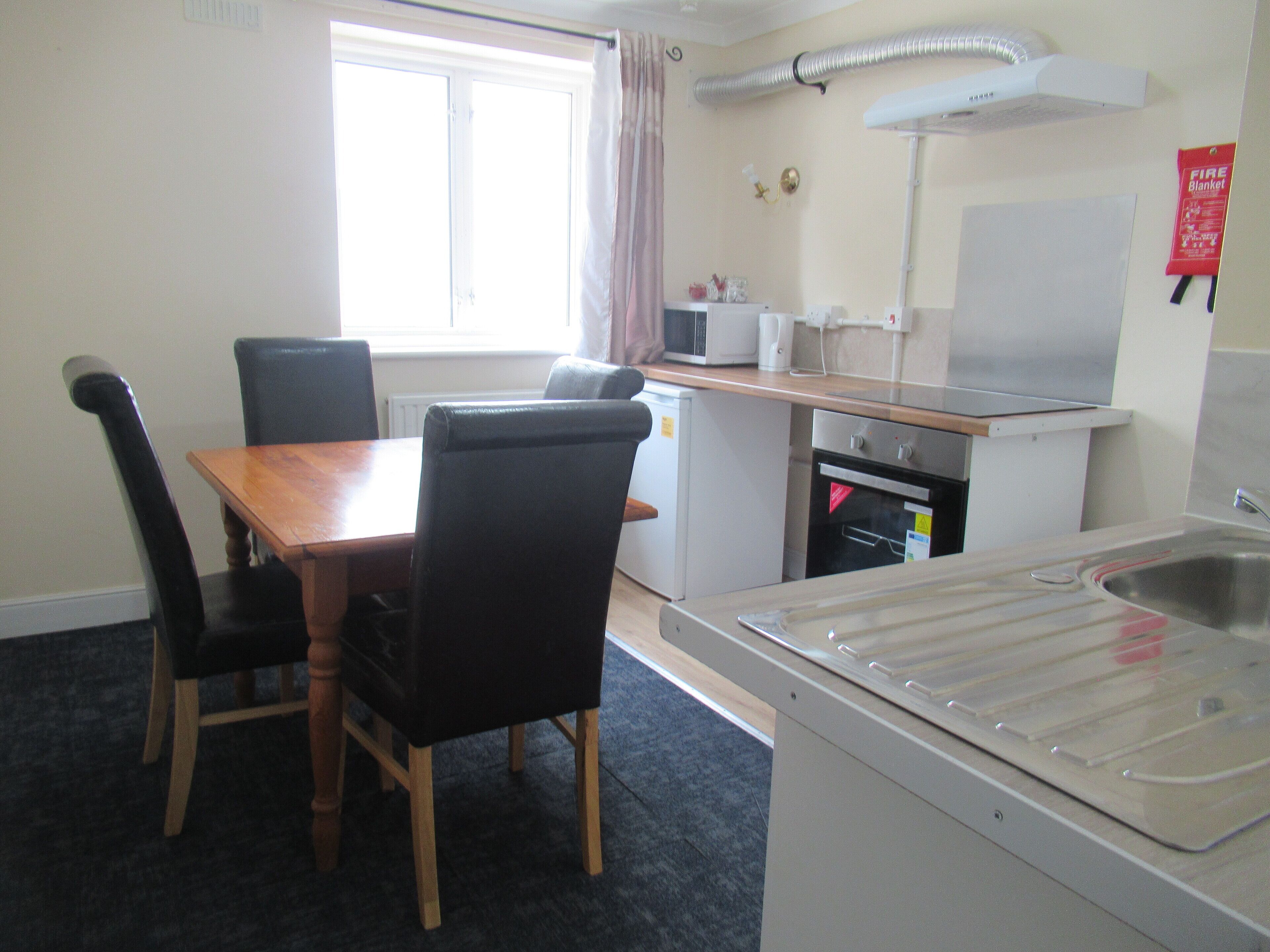 Fridge, microwave, cookware/dishes/utensils