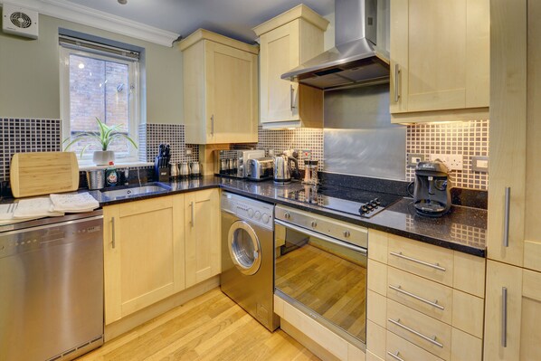 Microwave, stovetop, dishwasher, coffee/tea maker