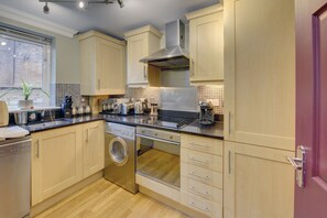 Microwave, stovetop, dishwasher, coffee/tea maker