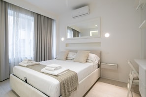 Deluxe-Apartment | Hochwertige Bettwaren, Daunenbettdecken, individuell dekoriert