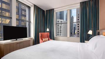 In-room safe, desk, laptop workspace, bed sheets