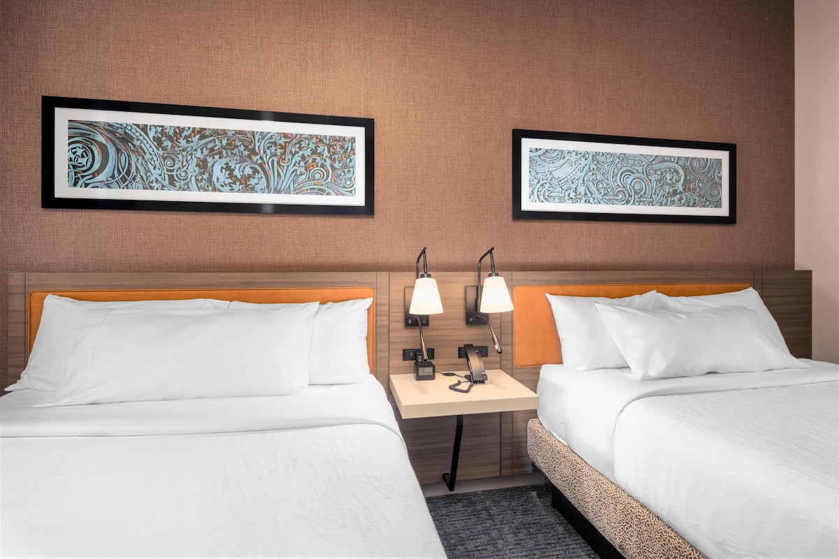 In-room safe, desk, laptop workspace, bed sheets