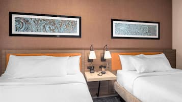 In-room safe, desk, laptop workspace, bed sheets