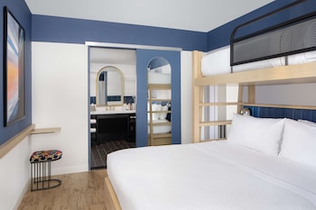 Two Bedroom, 1.5 Bath Suite | In-room safe, soundproofing, free WiFi, bed sheets at Motto by Hilton New York City Chelsea