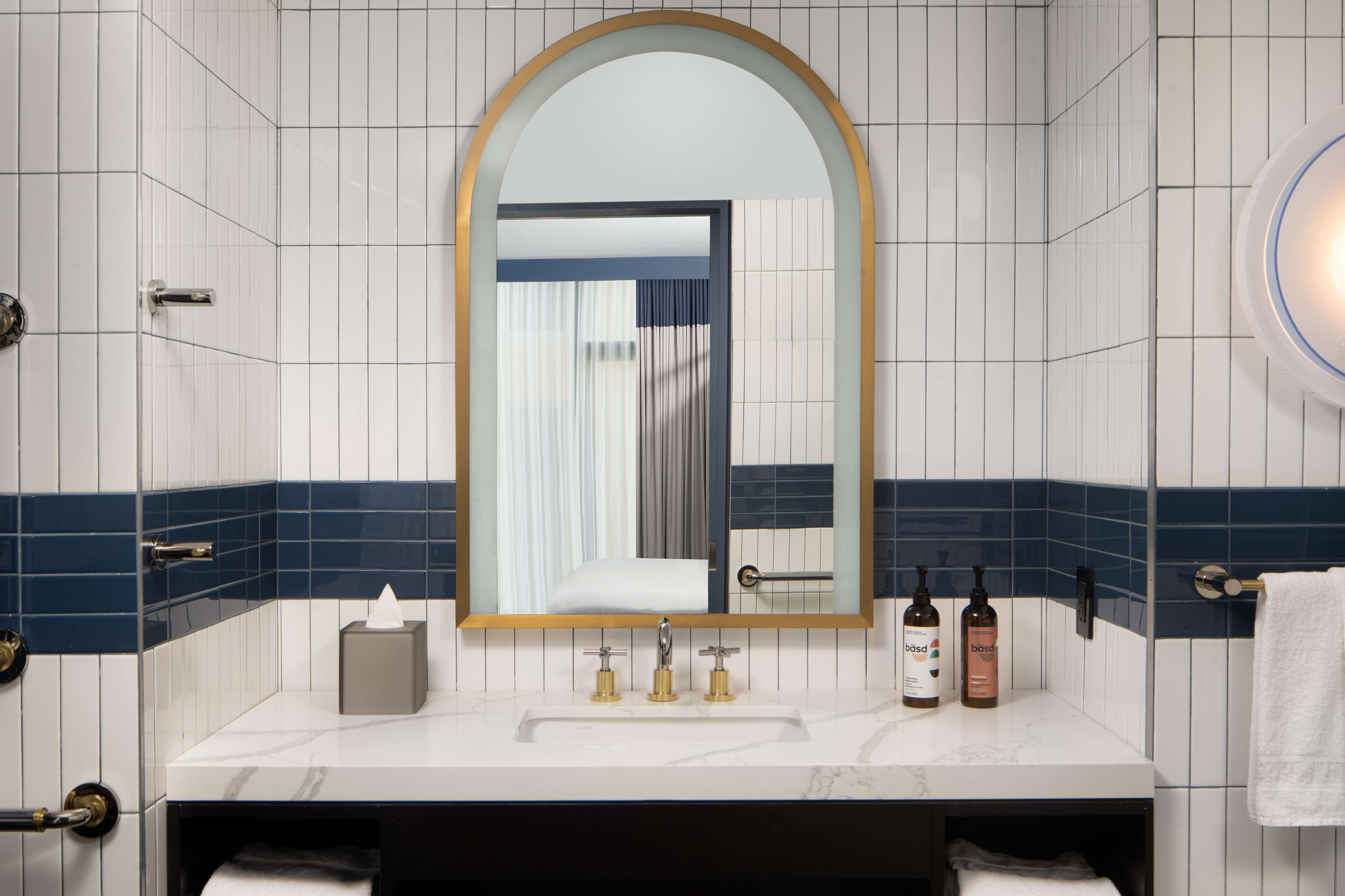 two bedroom, 1.5 bath suite | bathroom | shower, free toiletries, hair dryer, towels