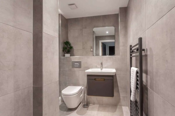 Shower, free toiletries, hair dryer, towels