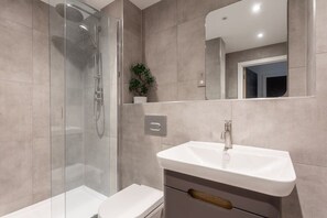 Shower, free toiletries, hair dryer, towels