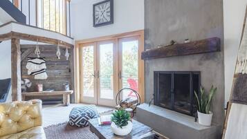 TV, fireplace, books